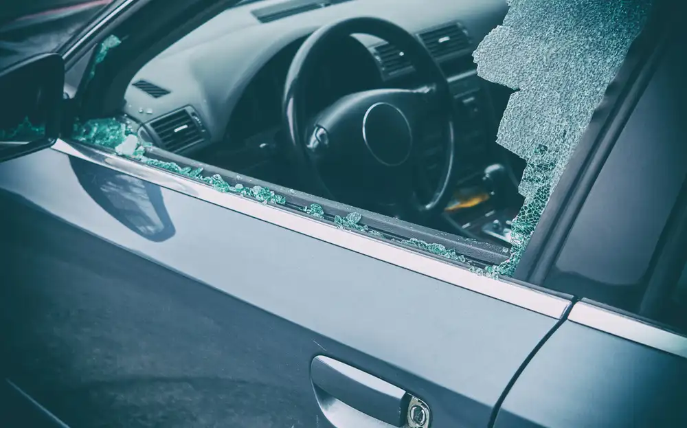 Shattered car side window highlighting the need for a reliable quarter window replacement – understanding the Quarter Window Replacement Cost is essential.